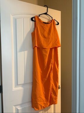 Sleeveless Orange Overlay top and skirt